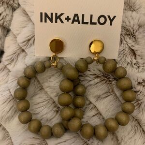 NWT- wood bead circle earrings on gold tone posts by Ink + Alloy